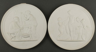A pair of Royal Copenhagen circular bisque plaques of classical scenes 4"