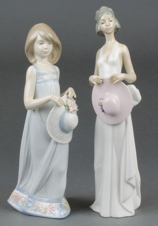 Two Lladro figures of girls holding hats 5643 7 3/4" and 5597 8 1/4"