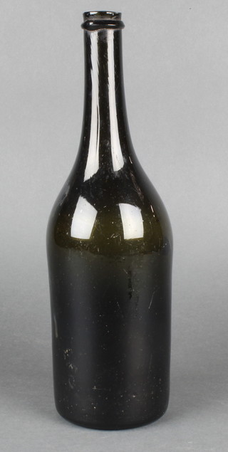 An Antique green glass wine bottle 12" 