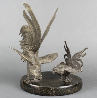 A bronzed figure group of 2 cockerels raised on an oval marble base 12" 