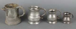 A Victorian pewter spouted pint measure marked Sussex and with Celestial crown, a William IV baluster half pint tankard marked VR (dents to base), a half pint measure, a Victorian gill measure (dents) and a Victorian baluster half gill measure 