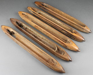 Five 19th Century wooden and metal spinning shuttles 20 1/2" 