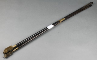 Two ebony and brass mounted gun cleaning rods and 1 other 