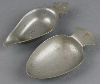 A pewter leaf shaped pap boat marked FH1800 Dent 5 1/2" together with a leaf shaped scoop with TH thistle mark 4" 