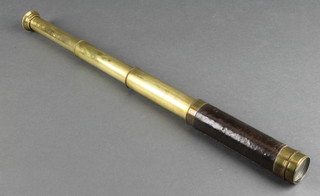 A 19th Century leather and brass 3 draw pocket telescope, slight dents to 2 of the draws 