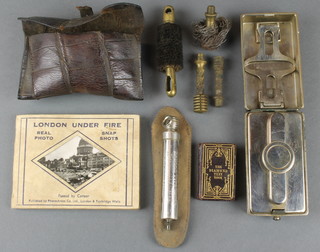 A Schrader balloon tyre pressure gauge, a French travelling curling tong heater marked JD Paris, 4 gun cleaning attachments, 1 volume "London Under Fire" and 1 volume "The Diamond Textbook" 
