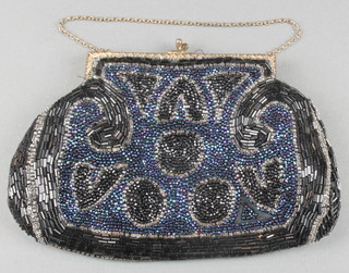 A lady's Art Deco bead work evening bag with black and green beads
