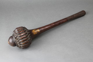 A good 18th/19th Century I-ula-drisla Fijian throwing club with 2 (ex 6) inlaid mounts, the handle with geometric decoration, 16" long, with old collection label