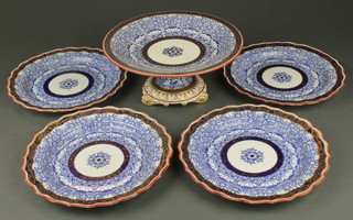 A Royal Worcester 19th Century Tazza and 4 plates with stylised blue floral decoration