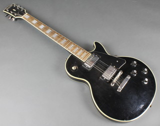 A Japanese Avon black lacquered electric guitar, the neck numbered Model 3403, serial no. 0975 
