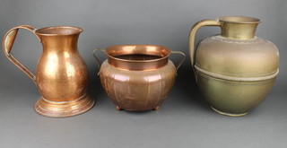 A melon shaped brass jug 13", a copper waisted jug on a spreading foot 11", a copper twin handled jardiniere of melon form 8" 