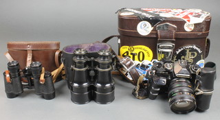 A Canon CE-4 camera with lens, a pair of Delmar 8 x 26 field glasses, a pair of 19th Century Watson & Sons binoculars
