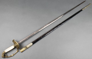 Harrison & Sons, Sackville Street London, a "Polish" naval court sword with 31 1/2" etched blade (some corrosion to the end) complete with chrome mounted and black leather scabbard painted 