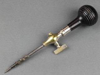 A 19th Century ebony and polished steel champagne spigot 7"