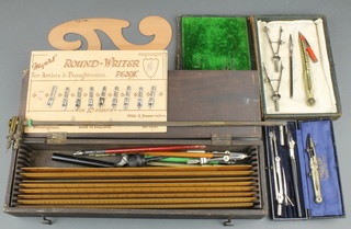 Eight boxwood rulers, a geometry set and other accessories 