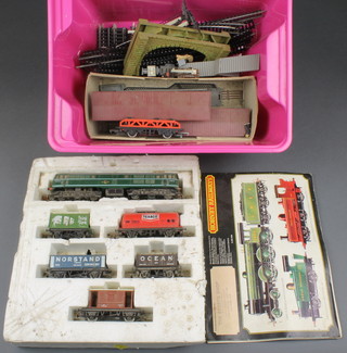 A Triang R.357 diesel locomotive goods set together with various track 