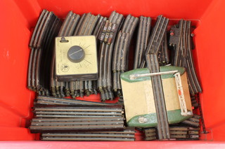 A quantity of various TTR Trix twin rails 410/1 together with a level crossing gate and a TTR 14v transformer 
