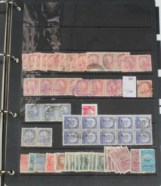 A stock book of various used World stamps 