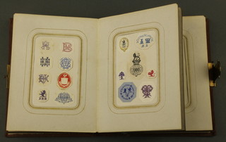 A Victorian leather bound album of various embossed letter heads