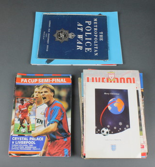 A collection of various football programmes and pamphlets relating to the war 
