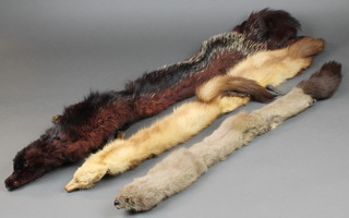 2 mink stoles contained in a Harrods box together with a brown fox fur 