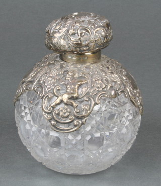 An Edwardian silver mounted cut glass spherical scent bottle Birmingham 1901