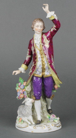 An early 20th Century Sitzendorf figure of a standing gentleman beside a stump with a lamb at his feet, on a raised rococo base 10" 