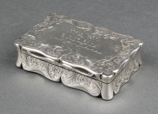 A Victorian rectangular table top snuff box with presentation inscription, chased scrolls and flowers, Birmingham 1846, 3 1/2" x 2" 

