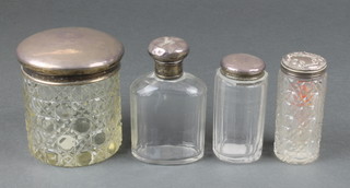 A silver mounted toilet jar, Birmingham 1922 and 3 others