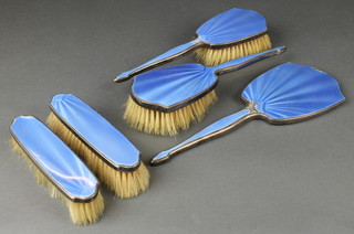 A silver and blue guilloche enamel 5 piece brush set comprising 2 hair and 2 clothes brushes and a mirror Birmingham 1935