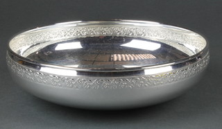 An Italian silver fruit bowl with fancy rim 8"