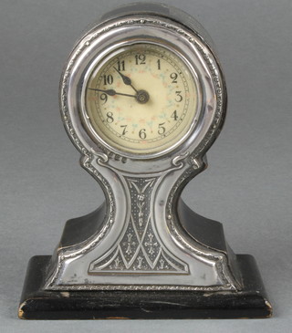 A George V silver mounted balloon bedroom timepiece Birmingham 1912