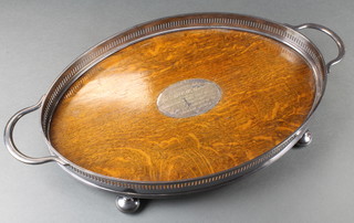 A Victorian silver plated mounted 2 handled oak tray 20"