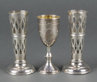 A silver Kiddish cup of plain form London 1928 and 2 vase holders 88g