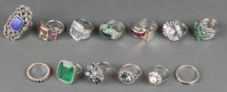 Thirteen silver dress rings