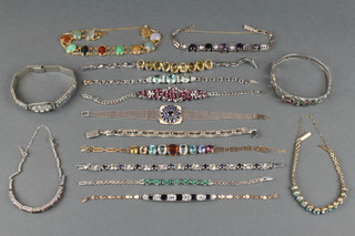 A silver gem set bracelet and minor bracelets