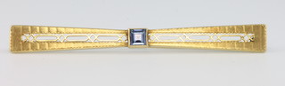 An Edwardian 15ct yellow gold bar brooch a 14ct aquamarine ditto