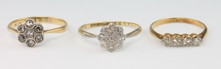 An 18ct yellow gold 4 stone diamond ring and 2 18ct yellow gold diamond cluster rings Sizes K, O and O 