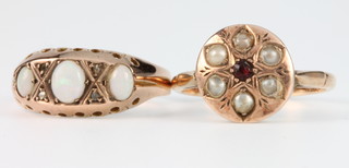 A 9ct yellow gold opal and diamond ring and a garnet and pearl ditto, sizes O and M 