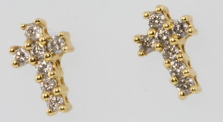 A pair of 18ct yellow gold diamond cross ear studs 