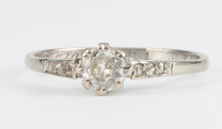 An 18ct white gold single stone diamond ring Size K