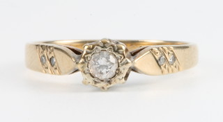 A 9ct yellow gold single stone diamond ring Size M