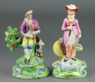 A 19th Century English porcelain figure of a seated bagpipe player sitting on a bocage tree stump a dog at his side 6 1/2" together with a ditto of a lady 7"