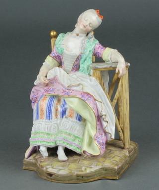 A 19th Century Meissen figure of a seated sleeping lady 8"