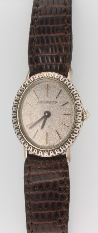 A lady's silver cased Jaeger Le Coultre wrist watch on a leather strap