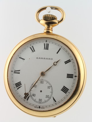 A gilt pocket watch with seconds at 6 o'clock and a Garrards gilt ditto