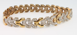 A 9ct gold diamond set bracelet, 23 grams