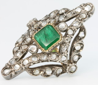 A yellow gold emerald and diamond up finger ring, size P