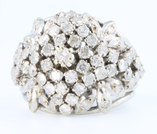 A white gold diamond set cocktail ring, size Q