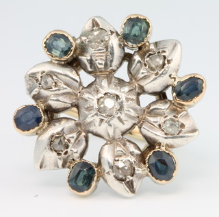 A yellow gold and silver sapphire and diamond floral cluster ring, size N 1/2